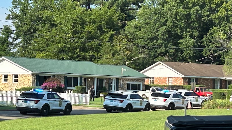 Police, including SWAT, are on scene near Highlands Elementary School in the Sparkman Drive...