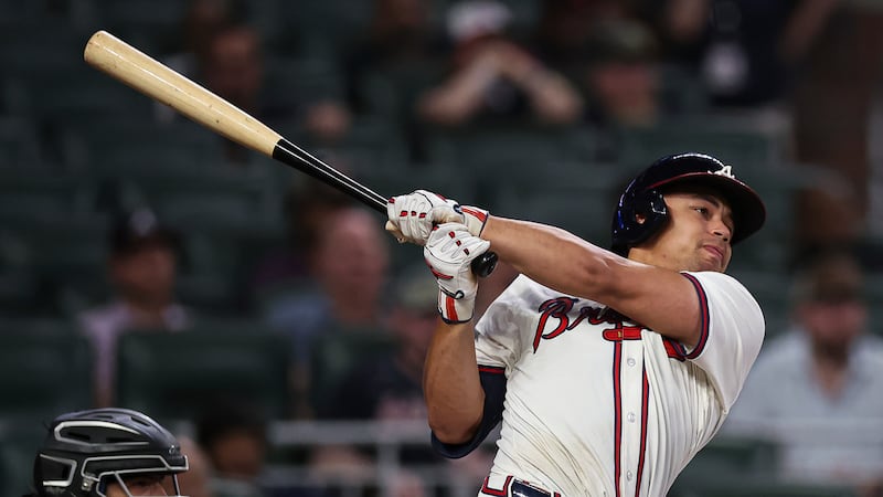 Atlanta Braves' Drake Baldwin hits a go-ahead two-run single in the eighth inning of a...
