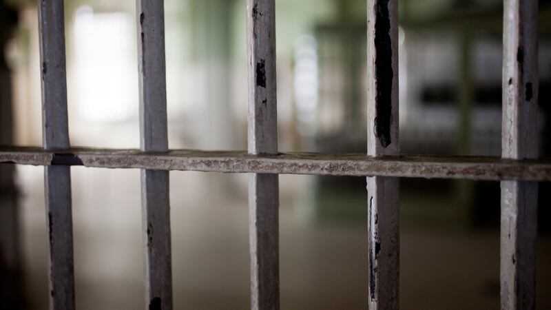 Generic prison bars graphic.