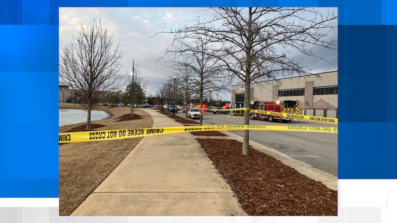 Huntsville police are investigating after a body was found in a pond in MidCity Saturday...