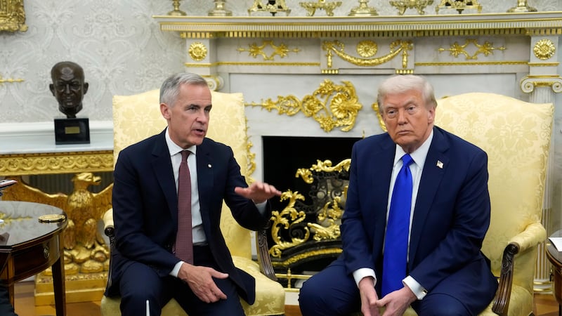 FILE - Canada Prime Minister Mark Carney and President Donald Trump hold a press conference at...