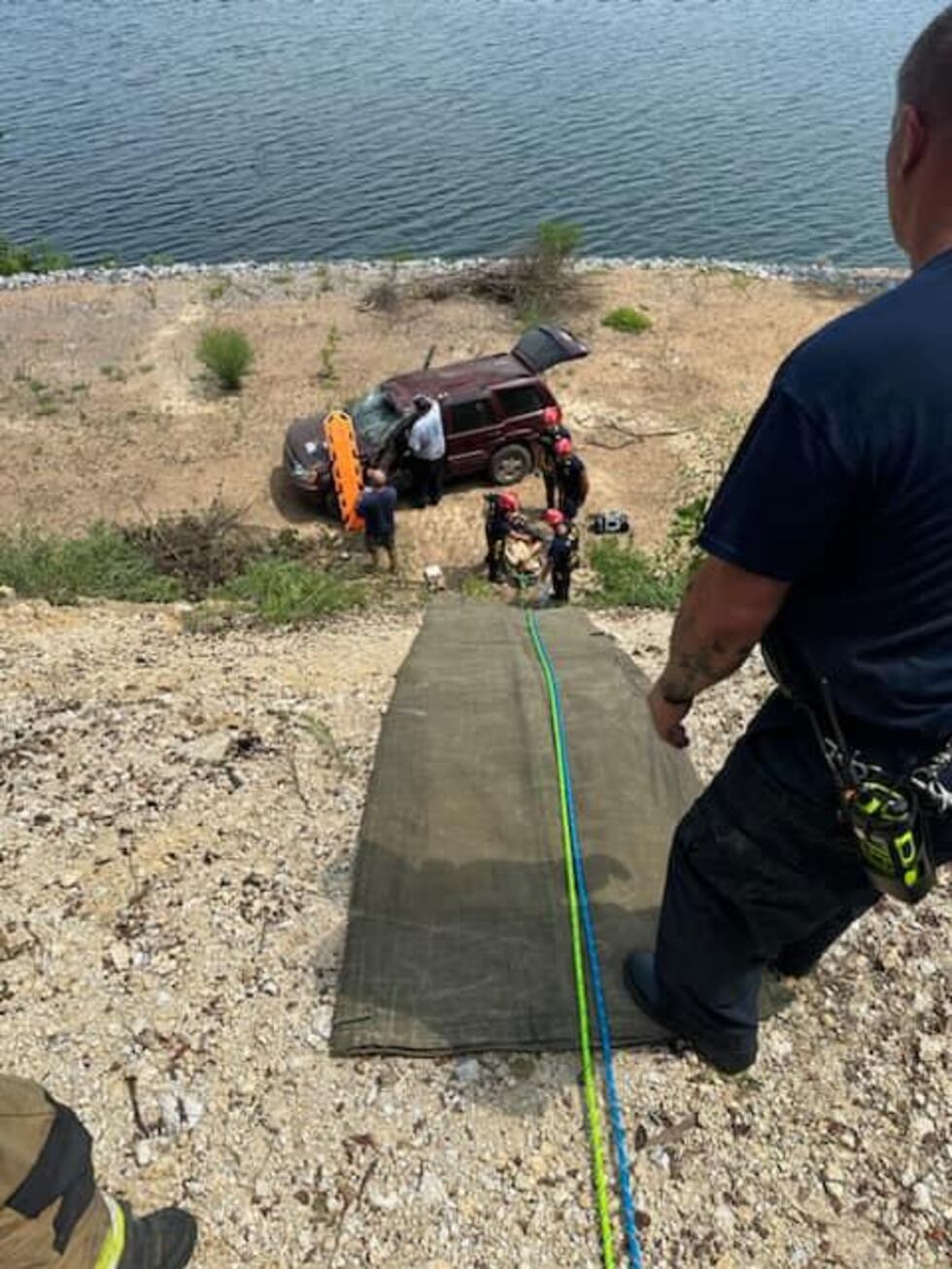 Multiple agencies assist in rope rescue after vehicle slides down ...