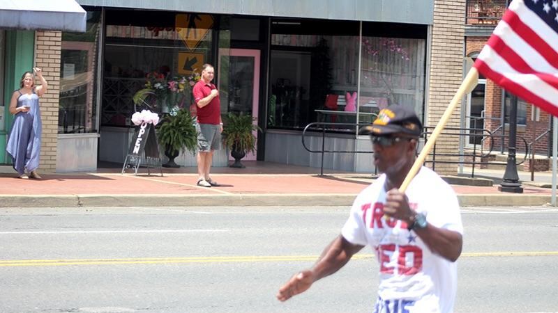 He grabbed Ole Glory and started running ten miles every Saturday to uplift those in the area...