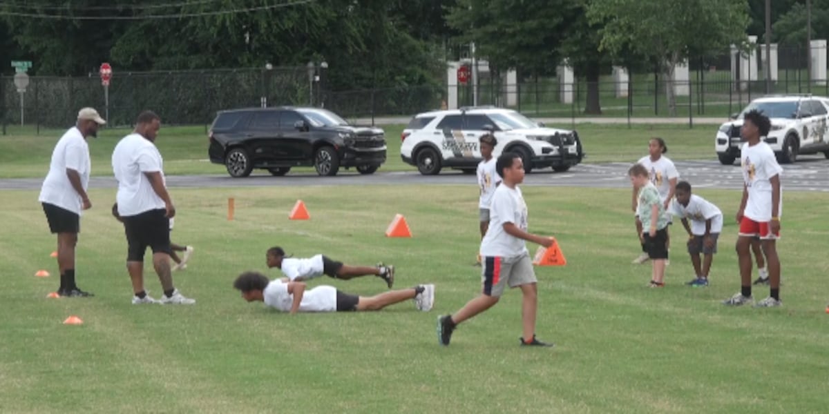 Trent Scott hosts community day and football camp