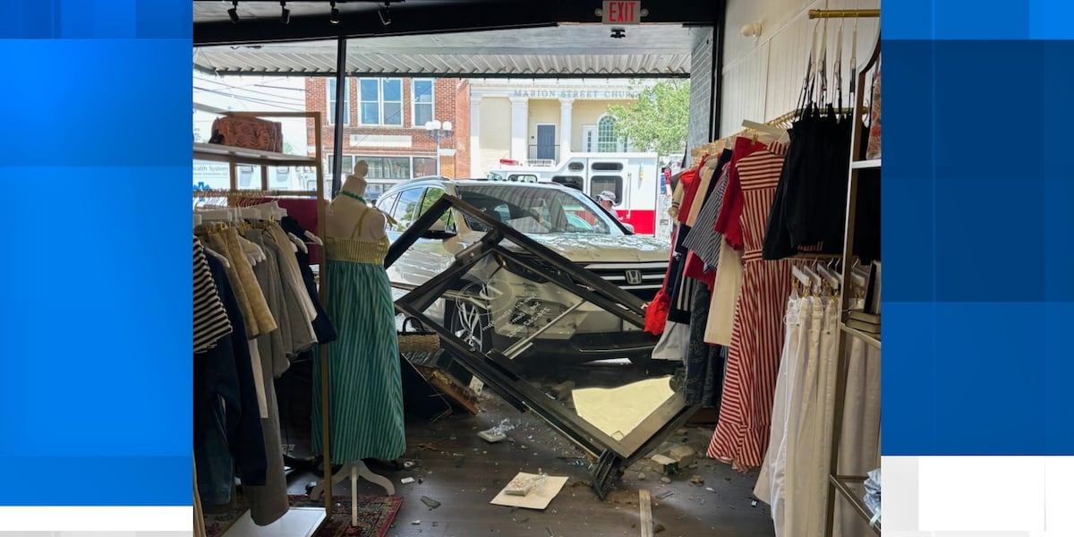 Car crashes into business on Athens Square